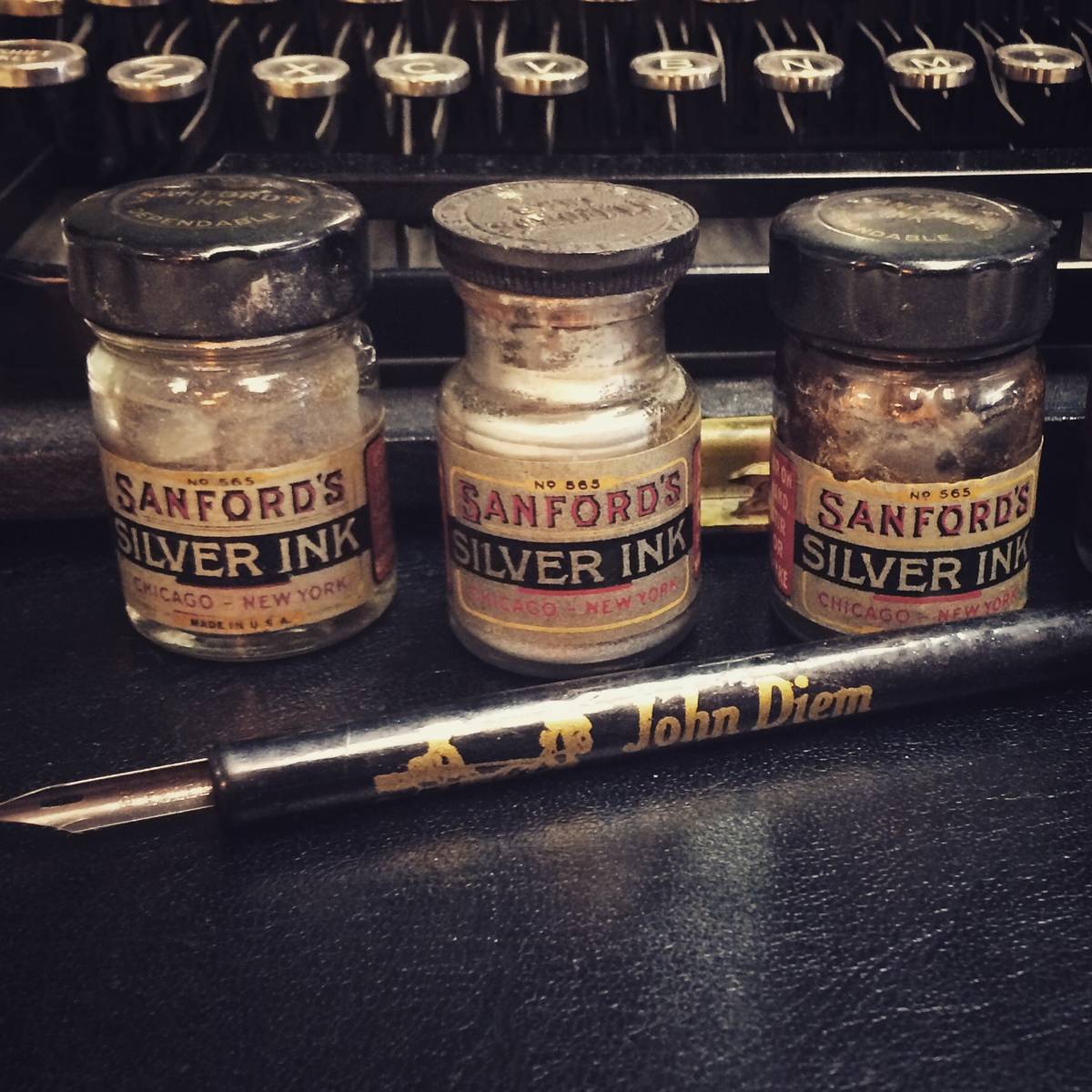 Sanford's silver ink bottles